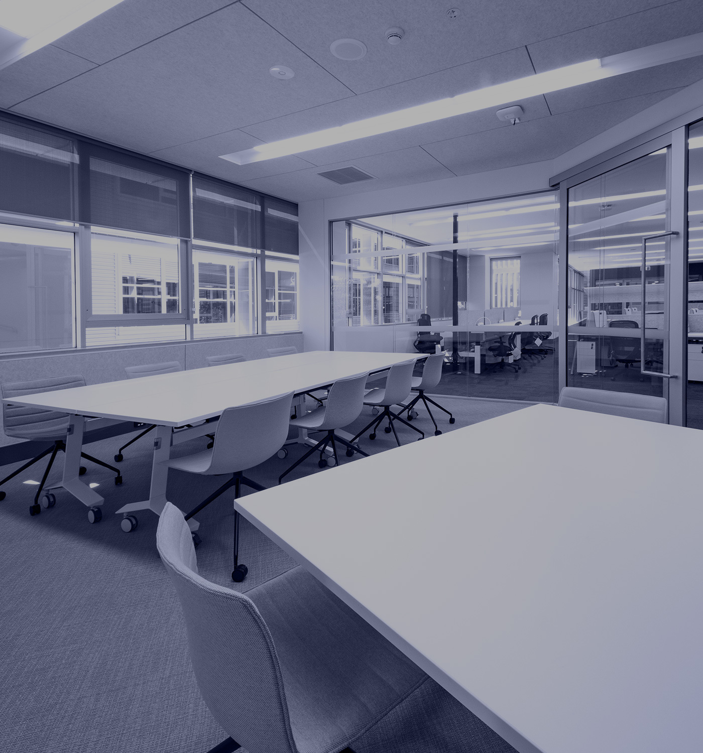 QUT Meeting room with yellow and grey chairs - blue